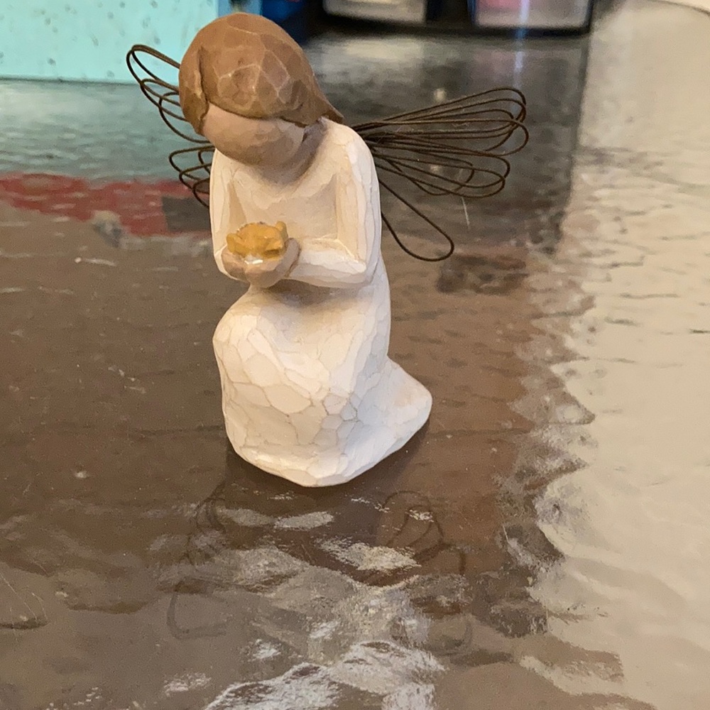 Willow tree girl holding a chick